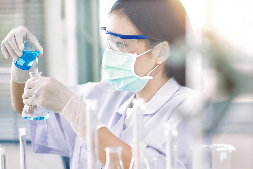 lab test with goggles and test tubes